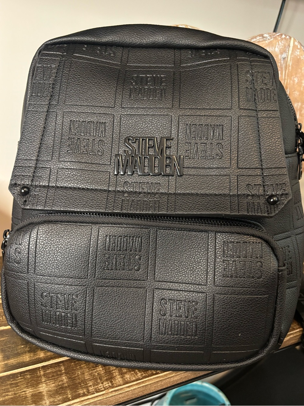 Steve Madden Black Embossed Logo Backpack